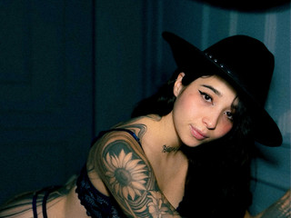 I have ink on my skin and fire in my eyes.