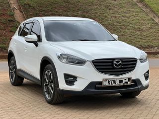 An apartment, a car and travelling to europe.